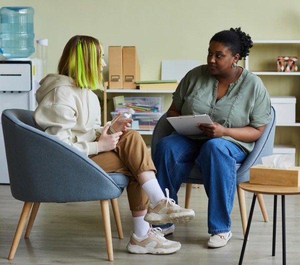 counsellor working with a young person