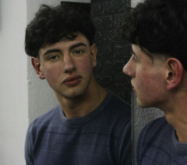 Looking into mirror